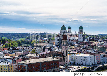 The town hall and St. Stephans cathedral in Passau, Germany, located in the old town of Passau on the Rathausplatz The town hall and St. Stephans cathedral in Passau, Germany, located in the old town of Passau on the Rathausplatz 125375220