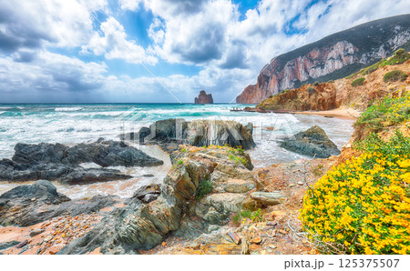 Attractive view of beach Portu Cauli in Masua with Pan di Zucchero at background. 125375507