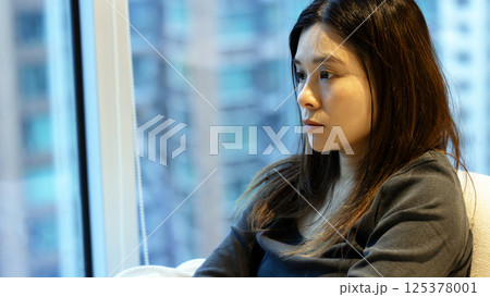 woman with poker face and feel cool when evening woman with poker face and feel cool when evening 125378001