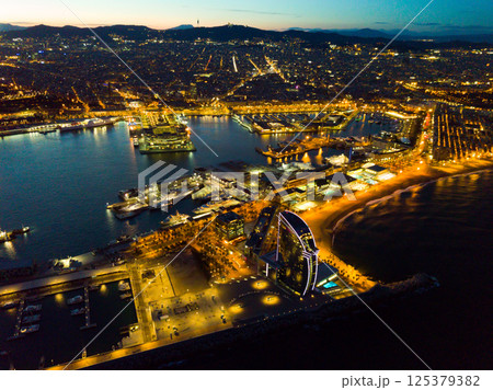 Night view of Port Vell in Barcelona 125379382
