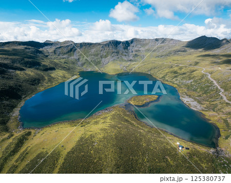 Aerial view of beautiful lake in high altitude mountains landscape 125380737