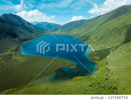 Aerial view of beautiful lake in high altitude mountains landscape 125380758