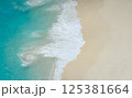 Aerial View of Waves on Sandy Beach 125381664
