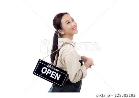 Portrait young asian barista woman wearing apron holding open sign for inviting customer to enter. Portrait young asian barista woman wearing apron holding open sign for inviting customer to enter. 125382192
