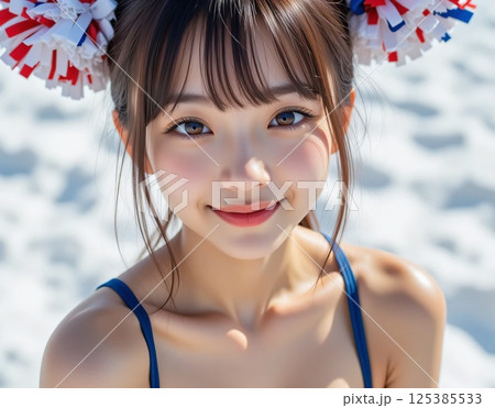 髪の毛をポンポンのアクセサリーでまとめたチアガール 125385533