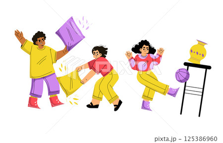 Having a fun pillow fight, showcasing playful group dynamics and joyful interactions 125386960