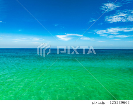 Aerial view beautiful sea surface nature background,Amazing waves texture ocean with clouds Aerial view beautiful sea surface nature background,Amazing waves texture ocean with clouds 125389662