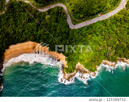 Top view seashore waves nature background,Amazing waves crashing on rocks seascape view Top view seashore waves nature background,Amazing waves crashing on rocks seascape view 125389732