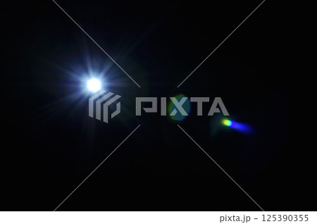 Sun flare on the black background 125390355