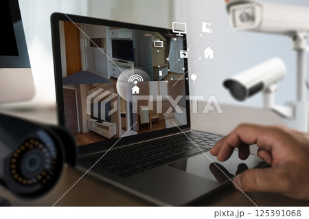 cctv security system man monitoring at office from smart phone Camera Footage On Screen 125391068