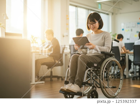 車椅子で働く日本人女性(ai生成画像) 車椅子で働く日本人女性(ai生成画像) 125392337