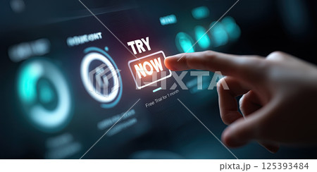 hand is pointing at digital screen with interactive Try Now button 125393484