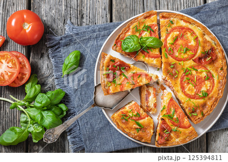 Freshly baked Italian Tomato Cheese Pie, top view Freshly baked Italian Tomato Cheese Pie, top view 125394811