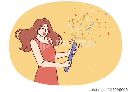 Woman launches firecracker with confetti during birthday or university graduation party 125396603