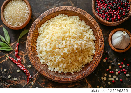 Organic Brown Rice in the bowl on the wooden table 125396836