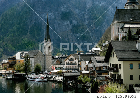 Alpine Village Nestled Among Mountain Peaks 125398053