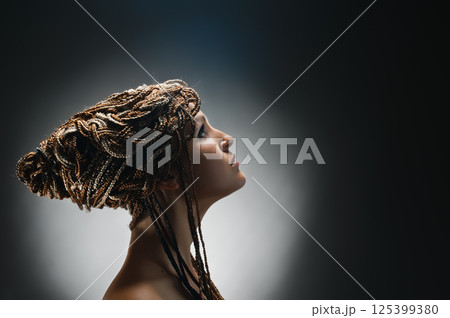 girl with an african plaits 125399380