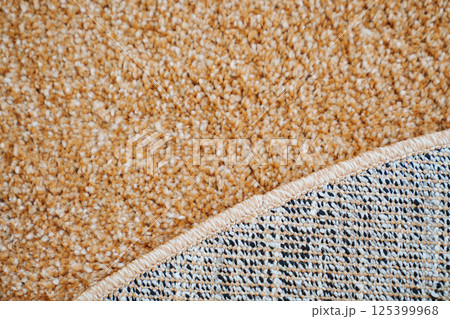 close-up. beige Interior pile carpet made of polypropylene. close-up. beige Interior pile carpet made of polypropylene. 125399968