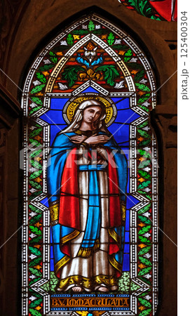 Immaculate Conception, stained glass window in the Basilica di Santa Croce (Basilica of the Holy Cross) - famous Franciscan church in Florence, Italy Immaculate Conception, stained glass window in the Basilica di Santa Croce (Basilica of the Holy Cross) - famous Franciscan church in Florence, Italy 125400304