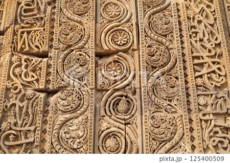 Stone carving on Qutub Minar, Delhi, India 125400509