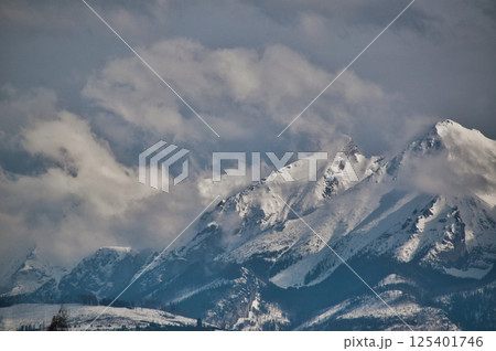 Snow-covered mountain peaks in the Tatra Mountains Snow-covered mountain peaks in the Tatra Mountains 125401746