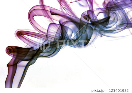 Colorful smoke swirls and twists on a white background Colorful smoke swirls and twists on a white background 125401982