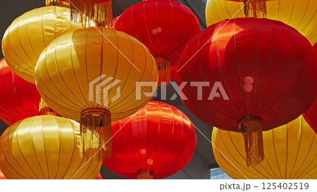 Vibrant red and yellow chinese lanterns 125402519