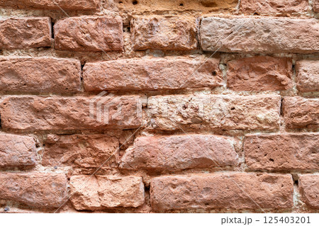 Close Up of Weathered Red Brick Wall 125403201