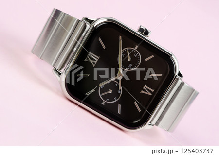 Product shot of a precious silver metal chronograph wrist watch with a black design placed. Product shot of a precious silver metal chronograph wrist watch with a black design placed. 125403737