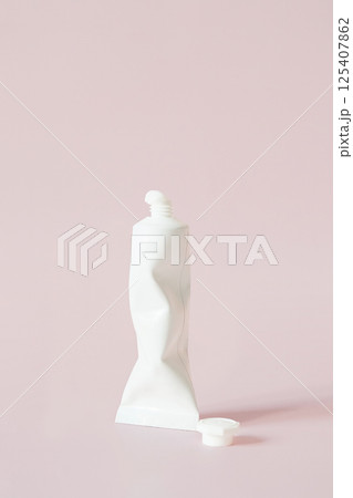 White Crumpled Tube Packaging for Cream or Toothpaste. Beauty Product Mockup with Lid Off. 125407862