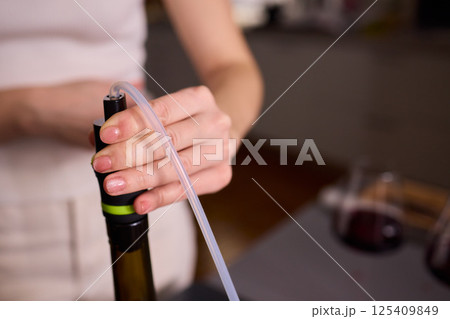 Experience the art of elegant wine pouring using the most modern and innovative tools available Experience the art of elegant wine pouring using the most modern and innovative tools available 125409849