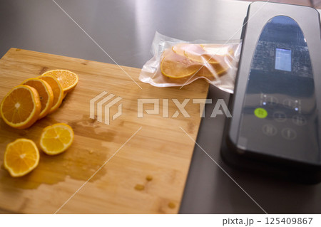 Efficiently Vacuum Sealing Fresh Citrus Fruits for Maximum Storage Time and Flavor Preservation Efficiently Vacuum Sealing Fresh Citrus Fruits for Maximum Storage Time and Flavor Preservation 125409867