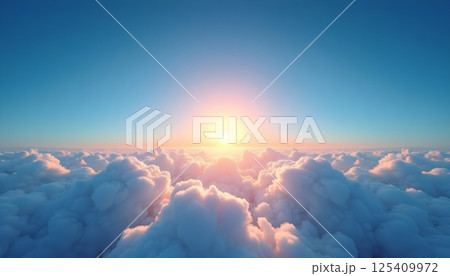 This stunning image captures a breathtaking aerial view of a sunrise or sunset above a sea of clouds. The photograph showcases a vast expanse of fluffy, cotton-like clouds stretching to the horizon.  125409972