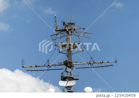 The mast of a large yacht with navigation equipment bottom view The mast of a large yacht with navigation equipment bottom view 125410459