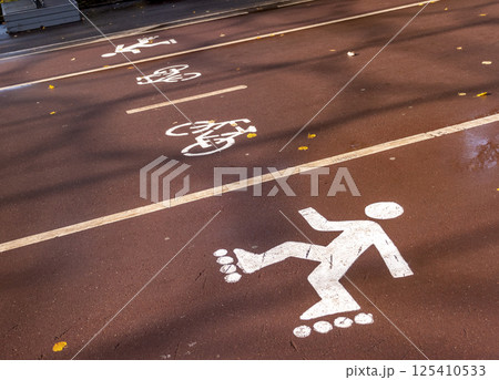 Running track bicycle and rollersat the stadium Running track bicycle and rollersat the stadium 125410533