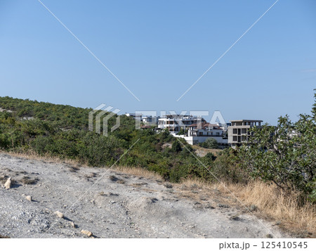Black sea coast. bald mountain. Beautiful blue sea in Myskhako 125410545