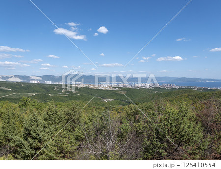 Black sea coast. bald mountain. Beautiful blue sea in Novorossiysk Black sea coast. bald mountain. Beautiful blue sea in Novorossiysk 125410554