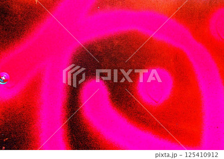 Spray paint on a steel plate. Abstract texture. Changed color scheme. Bright colorful background. Spray paint on a steel plate. Abstract texture. Changed color scheme. Bright colorful background. 125410912