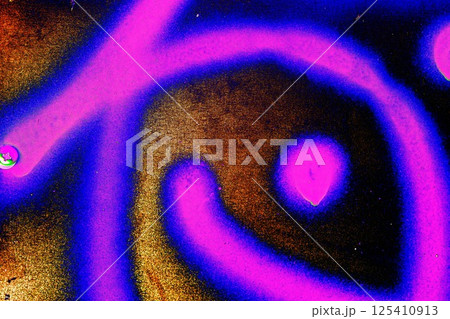 Spray paint on a steel plate. Abstract texture. Changed color scheme. Bright colorful background. Spray paint on a steel plate. Abstract texture. Changed color scheme. Bright colorful background. 125410913