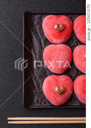 Delicious sweet mochi in the shape of red hearts 125411570