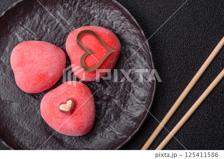 Delicious sweet mochi in the shape of red hearts Delicious sweet mochi in the shape of red hearts 125411586