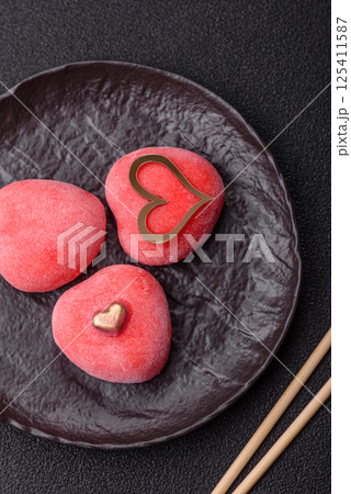Delicious sweet mochi in the shape of red hearts Delicious sweet mochi in the shape of red hearts 125411587