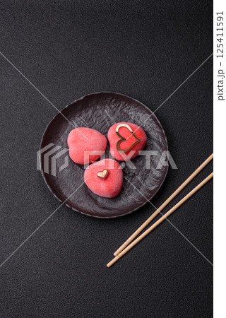 Delicious sweet mochi in the shape of red hearts Delicious sweet mochi in the shape of red hearts 125411591