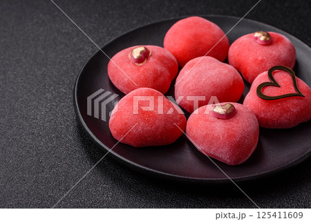 Delicious sweet mochi in the shape of red hearts 125411609