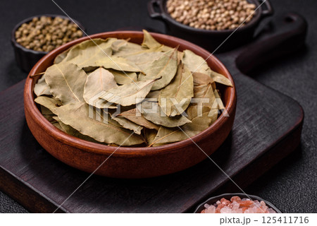 Dried bay leaves, spice, seasoning for cooking at home Dried bay leaves, spice, seasoning for cooking at home 125411716