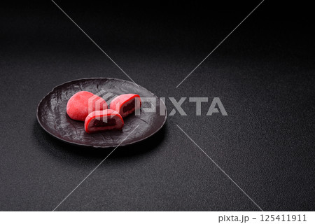 Delicious sweet mochi in the shape of red hearts Delicious sweet mochi in the shape of red hearts 125411911