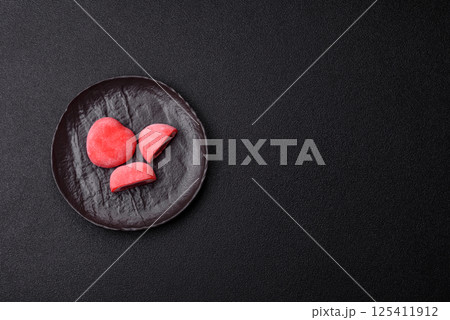 Delicious sweet mochi in the shape of red hearts 125411912