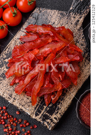 Dried chicken slices, jerky, with cherry or plum flavor, salt and spices 125412129