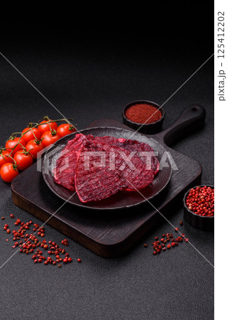 Dried beef slices, jerky, with cherry or plum flavor, salt and spices 125412202