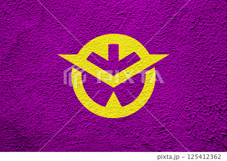 Official flag of Okayama. Prefecture in Japan. Conceptual collage on the texture of plastered wall 125412362